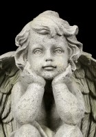 Engel Gartenfigur - Junge schaut verträumt
