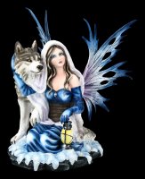 Fairy Figurine kneels with Wolf
