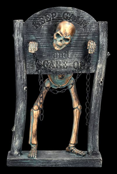 Skelett Figur am Pranger