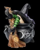 Witch Figurine falls into Cauldron