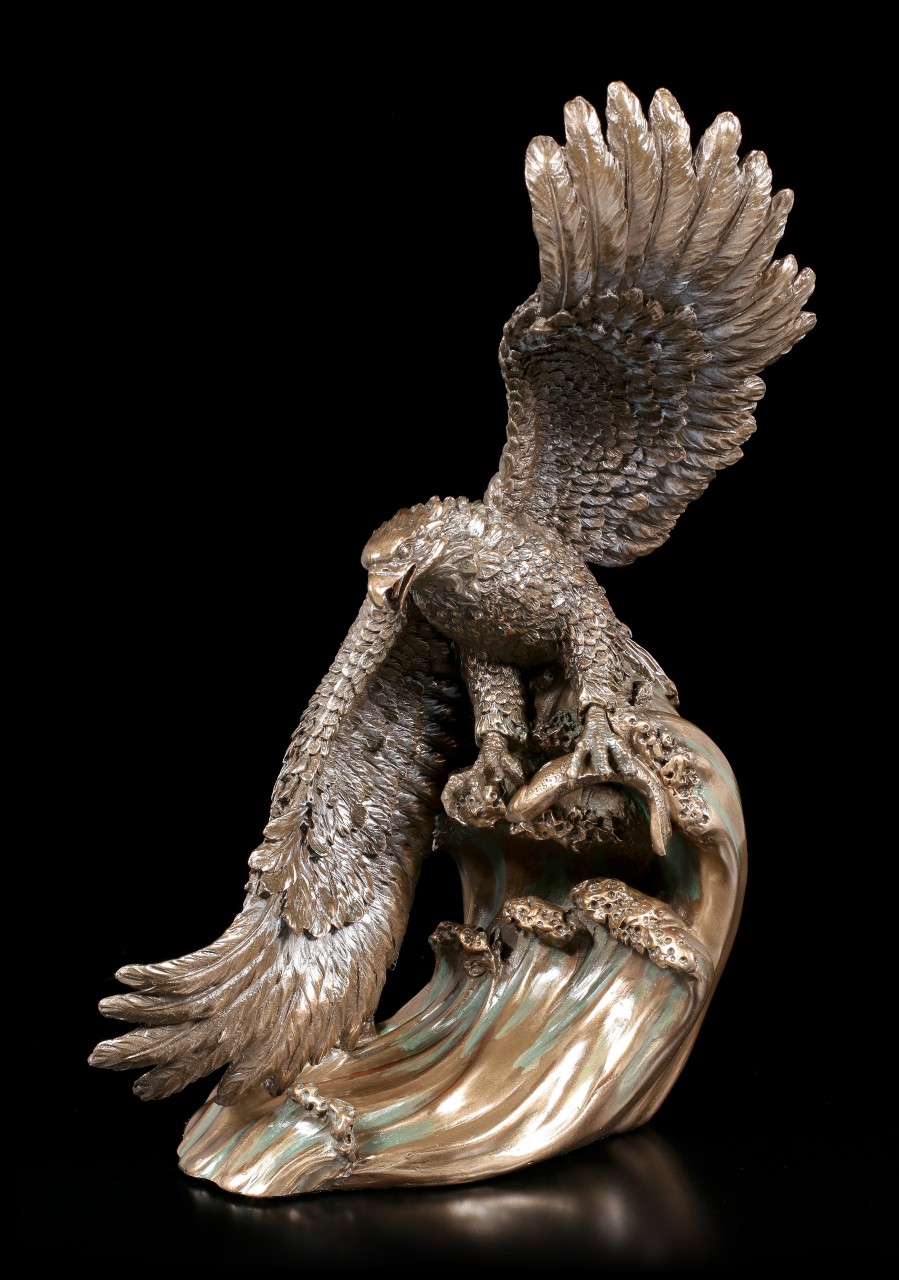 Eagle Figurine snaps Fish out of the Water 