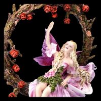 Fairy Figurine in a Rose Arch