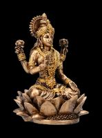 Small Lakshmi Figurine sitting on Lotus