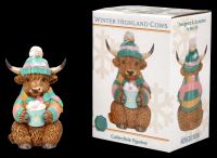 Highland Cow Winterfigur mit Kakao