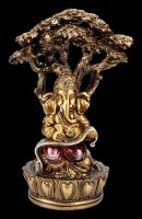 Ganesha Figur mit Schriftrolle unterm Baum