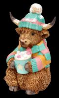 Highland Cow Winterfigur mit Kakao
