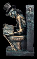 Skelett Figur auf Toilette - bronzefarben