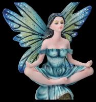 Fairy Figurine meditating on Stone
