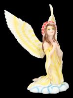 Engel Figur in gelbem Kleid betend