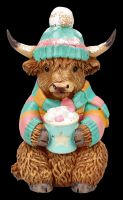 Highland Cow Winterfigur mit Kakao