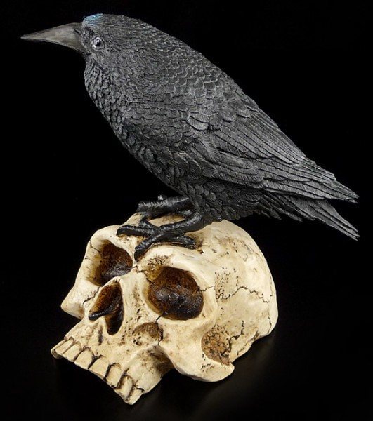 Raven Figurine sitting on Skull