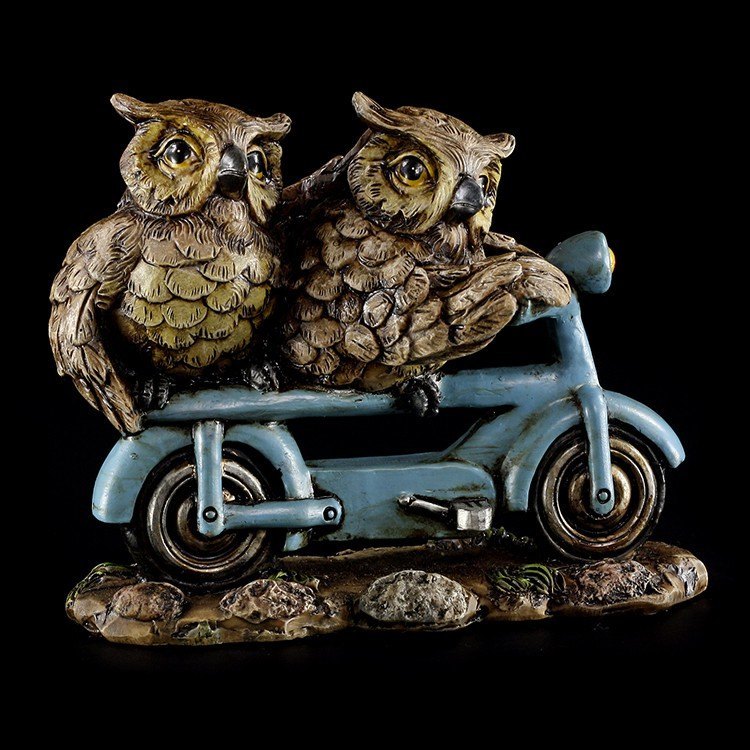 Owl Figurines on Bike
