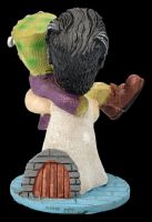 Pinheads Figur - Frankensteins Monster wird von Braut getragen