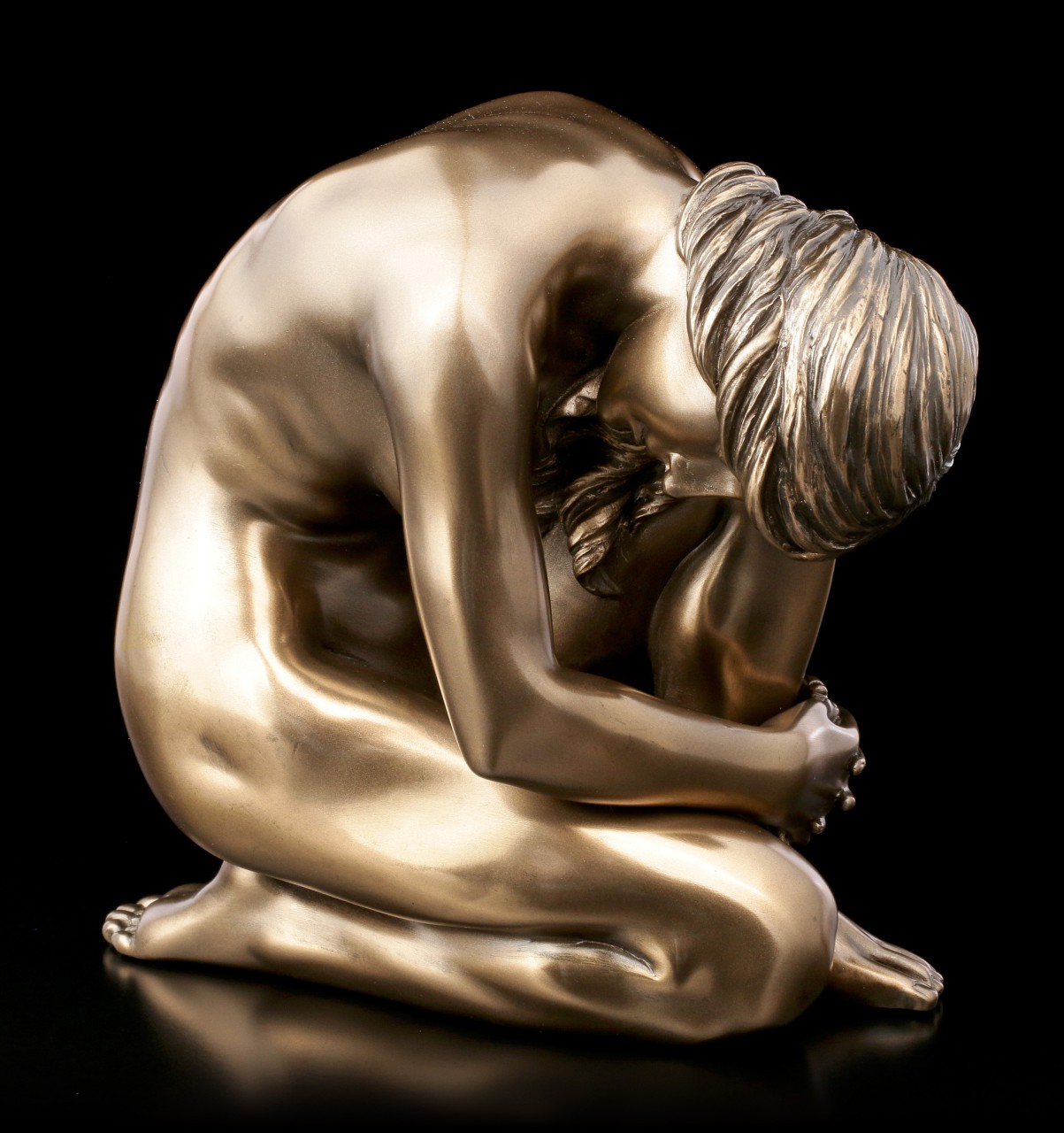 Female Nude Figurine Looking to the Ground