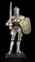 Small Knight Figure with Sword and Shield
