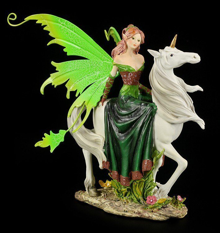 Fairy with green Dress on Unicorn