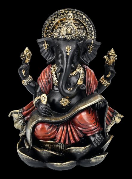 Ganesha Figur schreibt auf heilige Schriftrolle