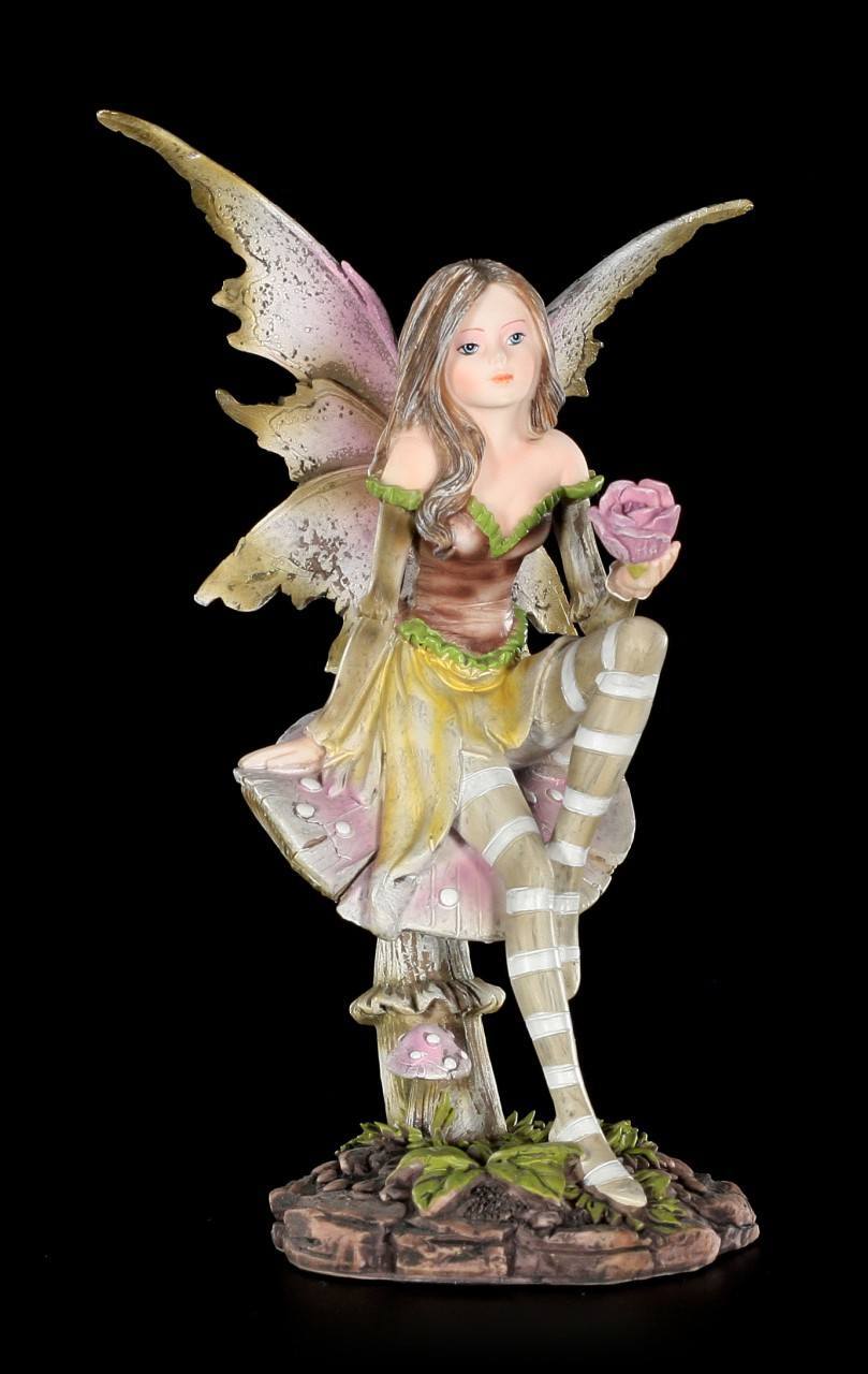 Yellow Fairy Figurine - Calista sitting on Mushroom