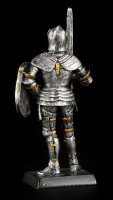 Small Knight Figure with Sword and Shield
