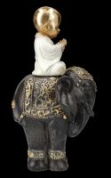 Buddha Figurine riding an Elephant