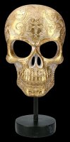 Goldfarbene Totenkopf Maske auf Metall Ständer