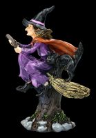 Witch Figurine Riding on a Broom with a Cat