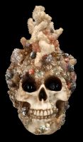 Skull Figurine Overgrown with Coral