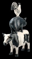 Cock on Pig on Cow Figurine