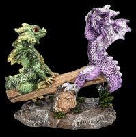 Dragon Figurines on Seesaw