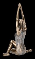 Weibliche Yoga Figur - Surya Namaskar Stellung