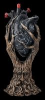 Greenman Figurine Embraces Black Heart