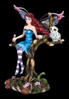 Elf Figurine Sitting on Branch with Owl