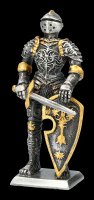 Pewter Knight Figurine holds Sword in front of Shield