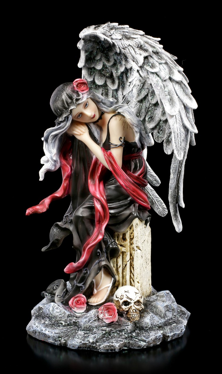 Dark Weeping Angel Figurine on Grave