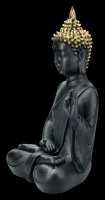 Schwarze Buddha Figur mit erhobener Hand