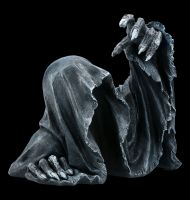 Grim Reaper Figurine rises from Grave