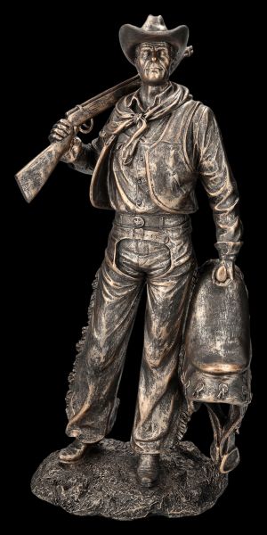Cowboy Figur mit Gewehr und Sattel