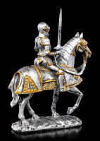 Kleine Ritter Figur mit erhobenem Schwert auf Pferd