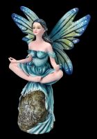 Fairy Figurine meditating on Stone