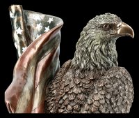 Eagle Figurine Sitting in Front of US flag