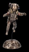Astronaut Figurine on Moon