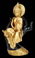 Buddha Figurine Sitting on Hand
