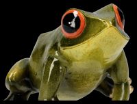 Froschfigur grün sitzend