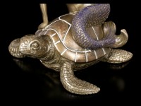 Meerjungfrau Figur auf Schildkröte