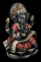 Ganesha Figur schreibt auf heilige Schriftrolle