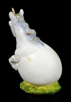 Unicorn Figurine frees itself from the Egg