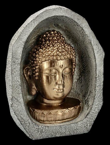 Goldfarbener Buddha Kopf im Stein