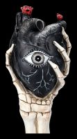 Skeleton Hand Holds Black Heart