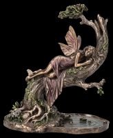 Fairy Figurine Sleeping on Tree over Pond